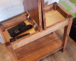 Table is made of solid oak and measures 10″ wide x 22″ long x 21 1/2” tall.