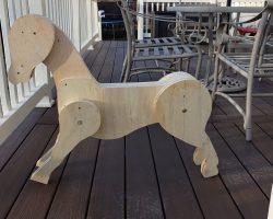 Initial assembly. It's made out of multiple layers of 3/4 inch plywood for strength. This is one of the few projects that I did not make a scale drawing first. Instead, I drew out the pieces full size on large pieces of masking paper. This was before my CNC days.