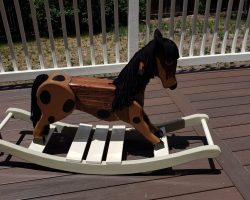 The seat is surprisingly comfortable being made of wood.
